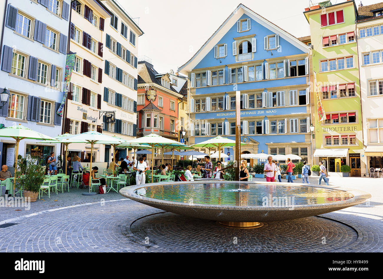 Zurich, Switzerland - September 2, 2016: Fountain and people at Munsterhof square, Zurich, Switzerland Stock Photo