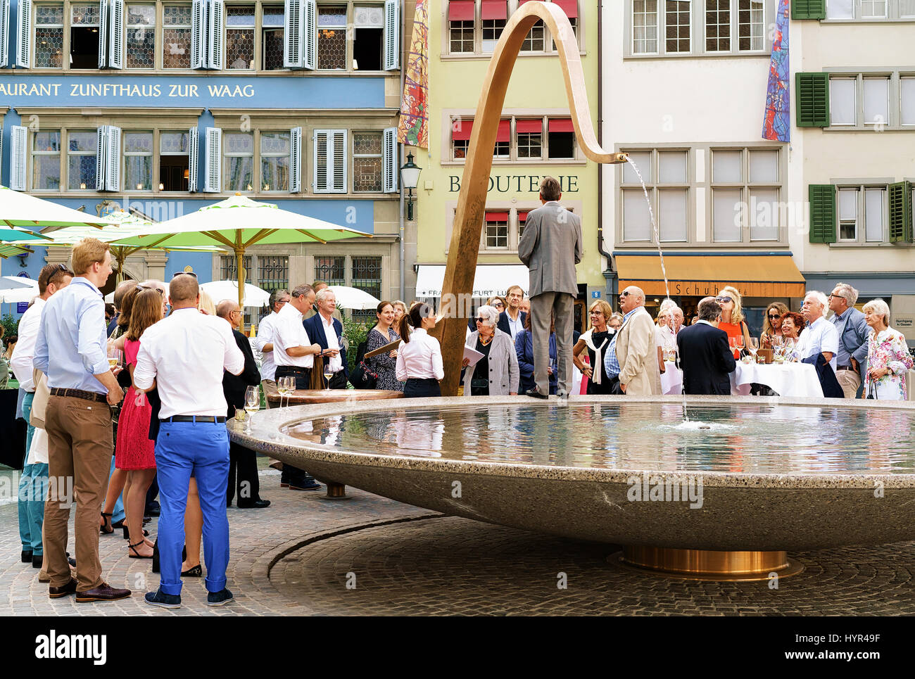 Zurich, Switzerland - September 2, 2016: People and fountain on Munsterhof square in Zurich, Switzerland Stock Photo