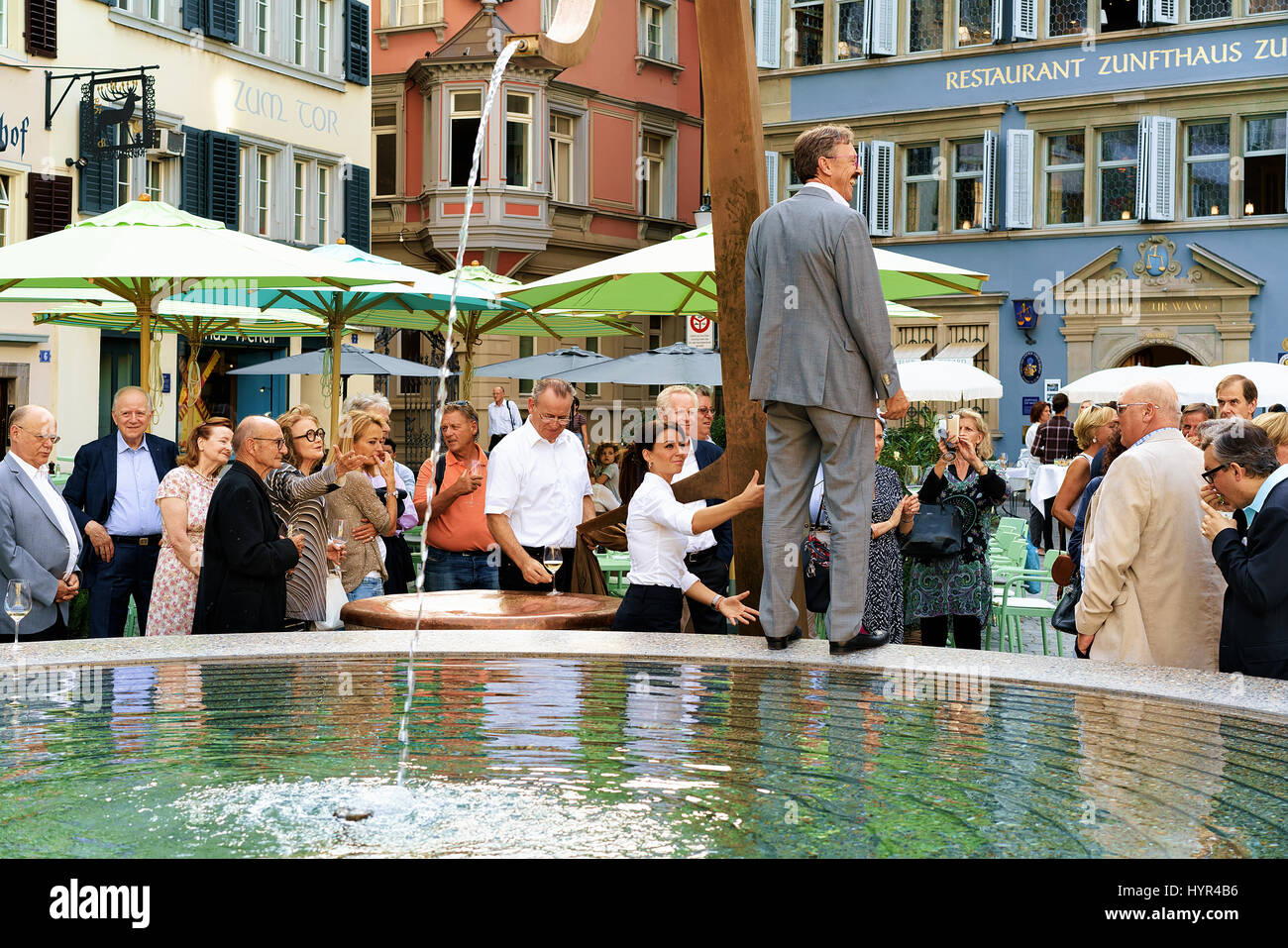 Zurich, Switzerland - September 2, 2016: People and fountain at Munsterhof square, Zurich, Switzerland Stock Photo