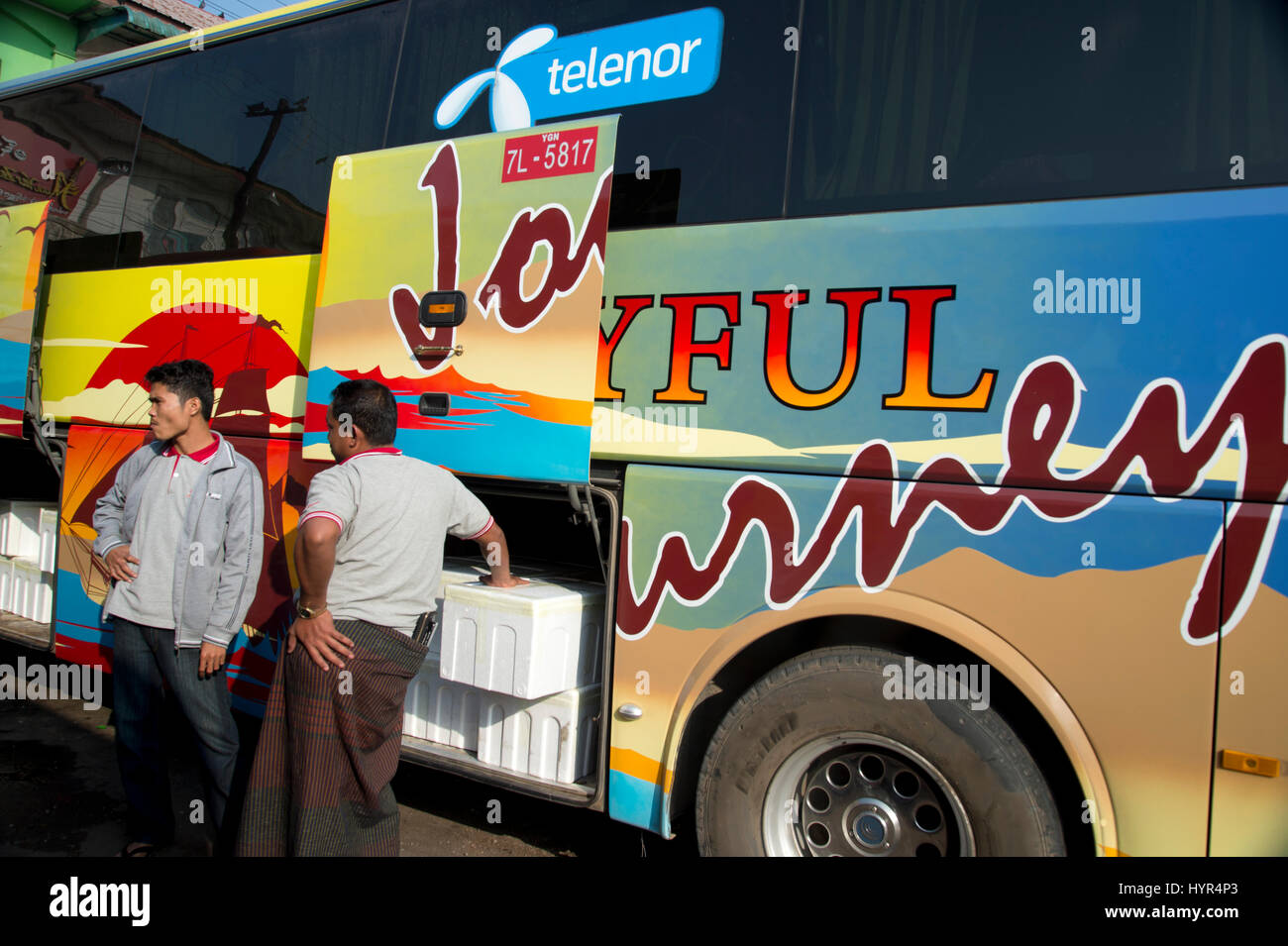 Myanmar (Burma). Mawlamyine. Bus station. Bus called 'Joyful Journey'. Stock Photo