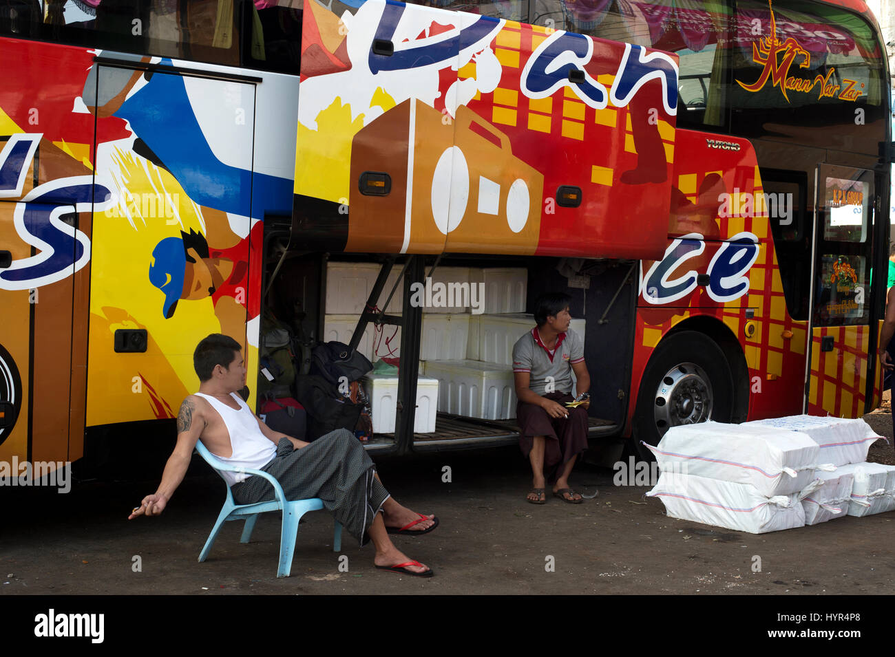 Myanmar (Burma). Mawlamyine. Bus station. Bus called 'Let's dance'. Stock Photo