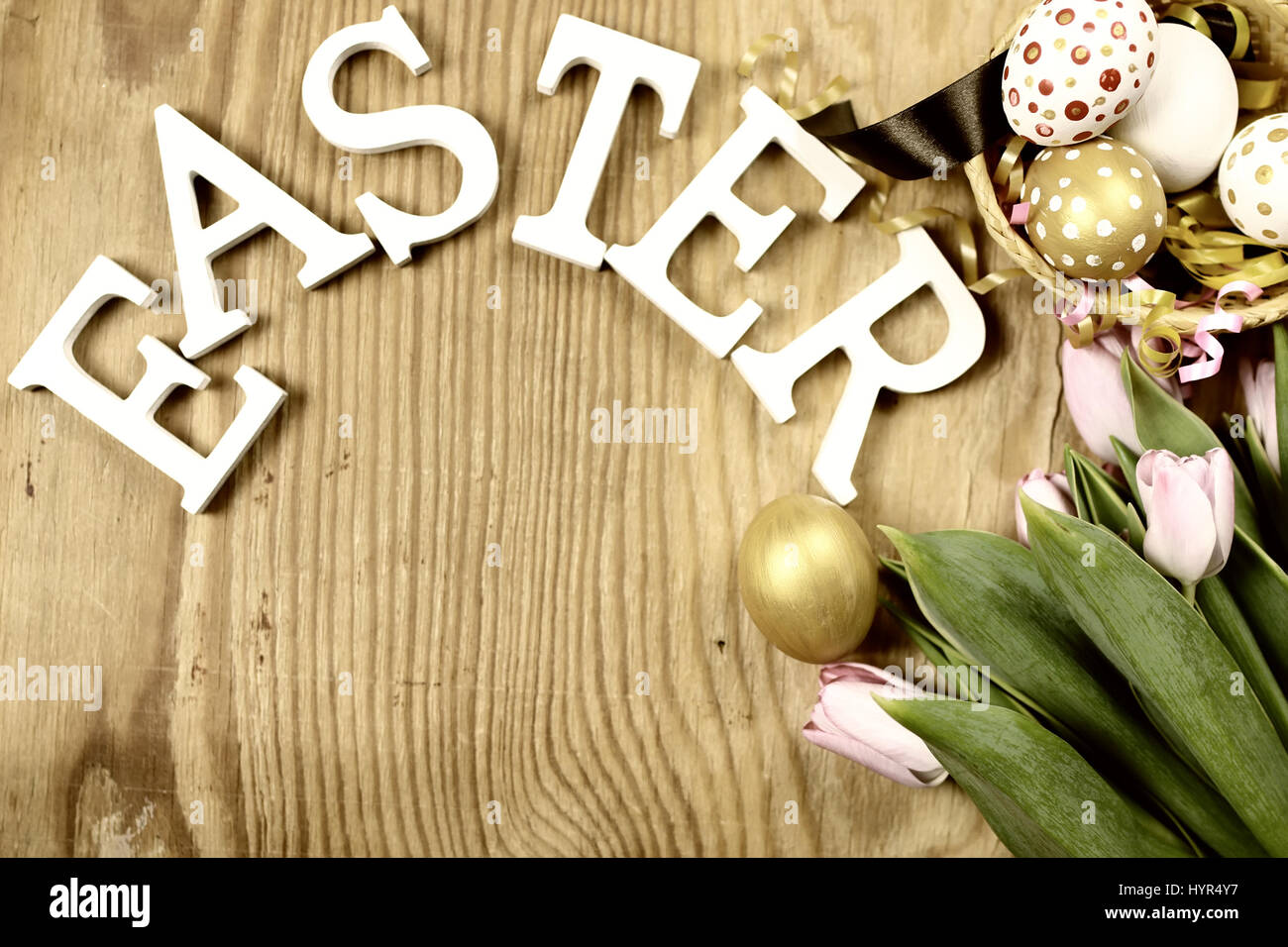 Toned background easter tulips and eggs Stock Photo - Alamy