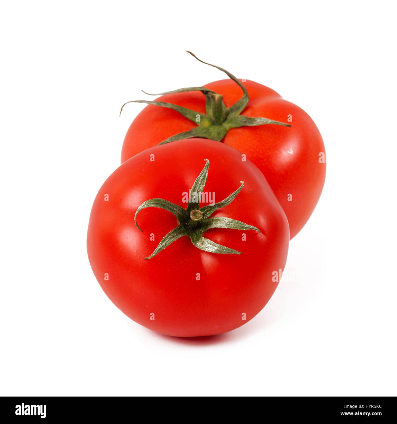 red tomatoes isolated on white background Stock Photo - Alamy