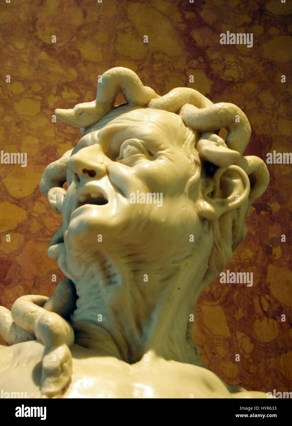 statue of Medusa against a textured background Stock Photo Alamy