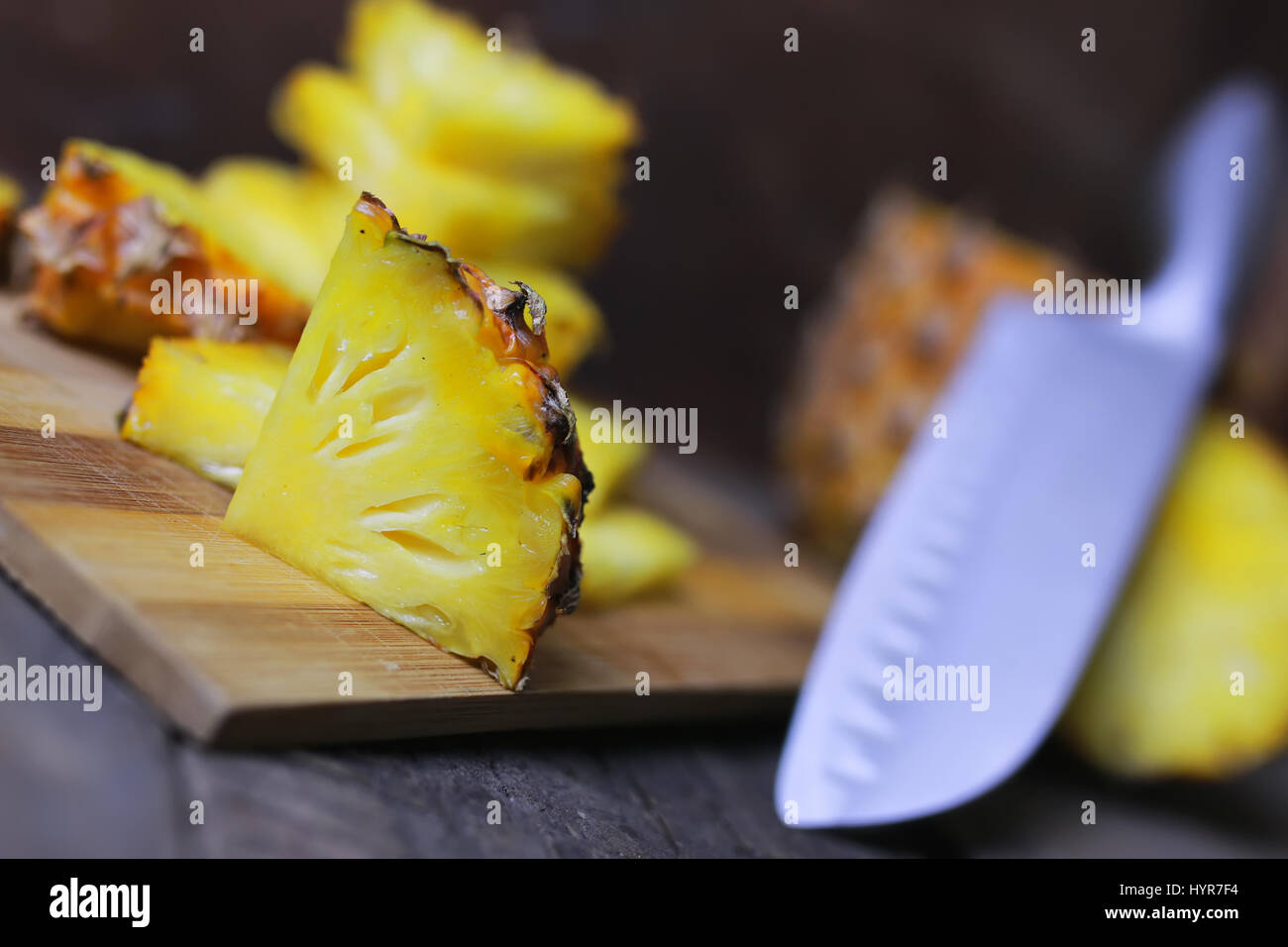 pineapple slices cut knife Stock Photo Alamy