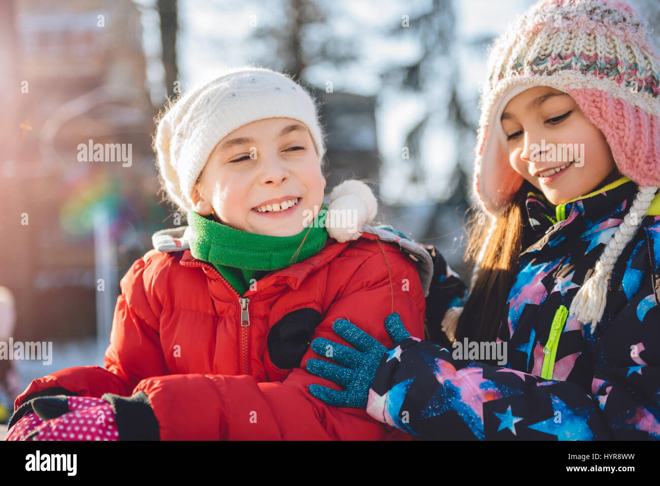 Two girls having fun outdoor in winter Stock Photo
