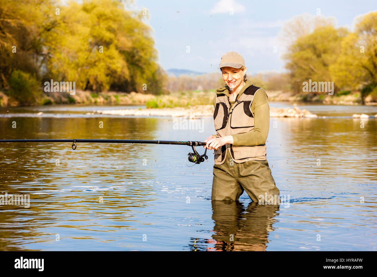 Woman fishing in the river hi-res stock photography and images - Page 2 -  Alamy
