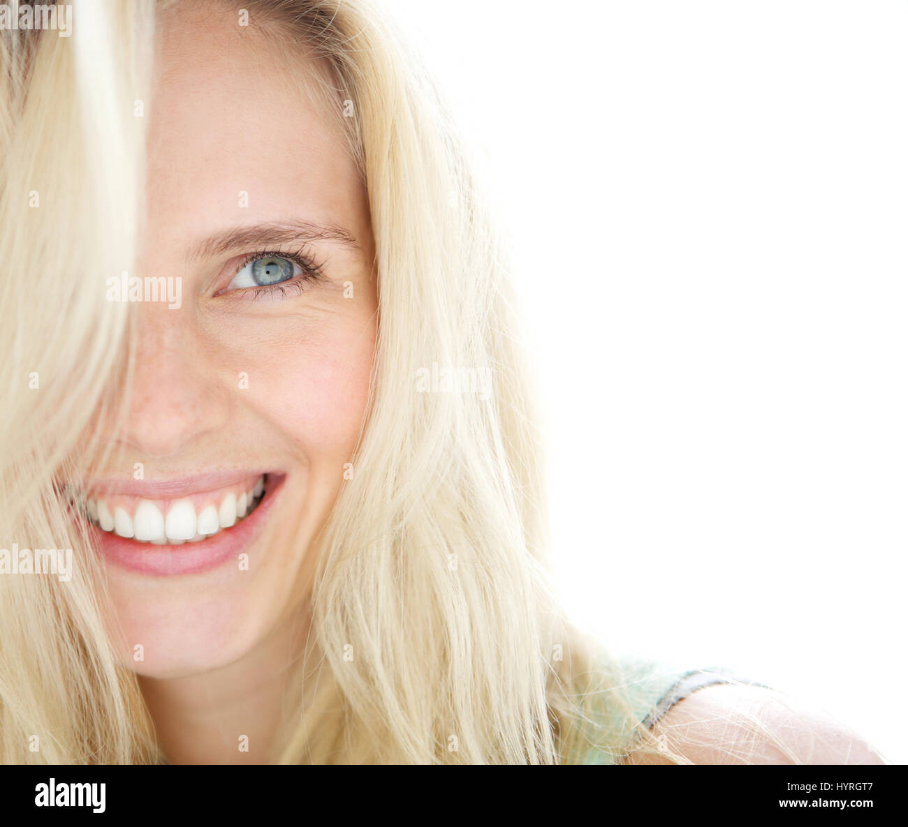 Close up portrait of a smiling blond woman Stock Photo - Alamy