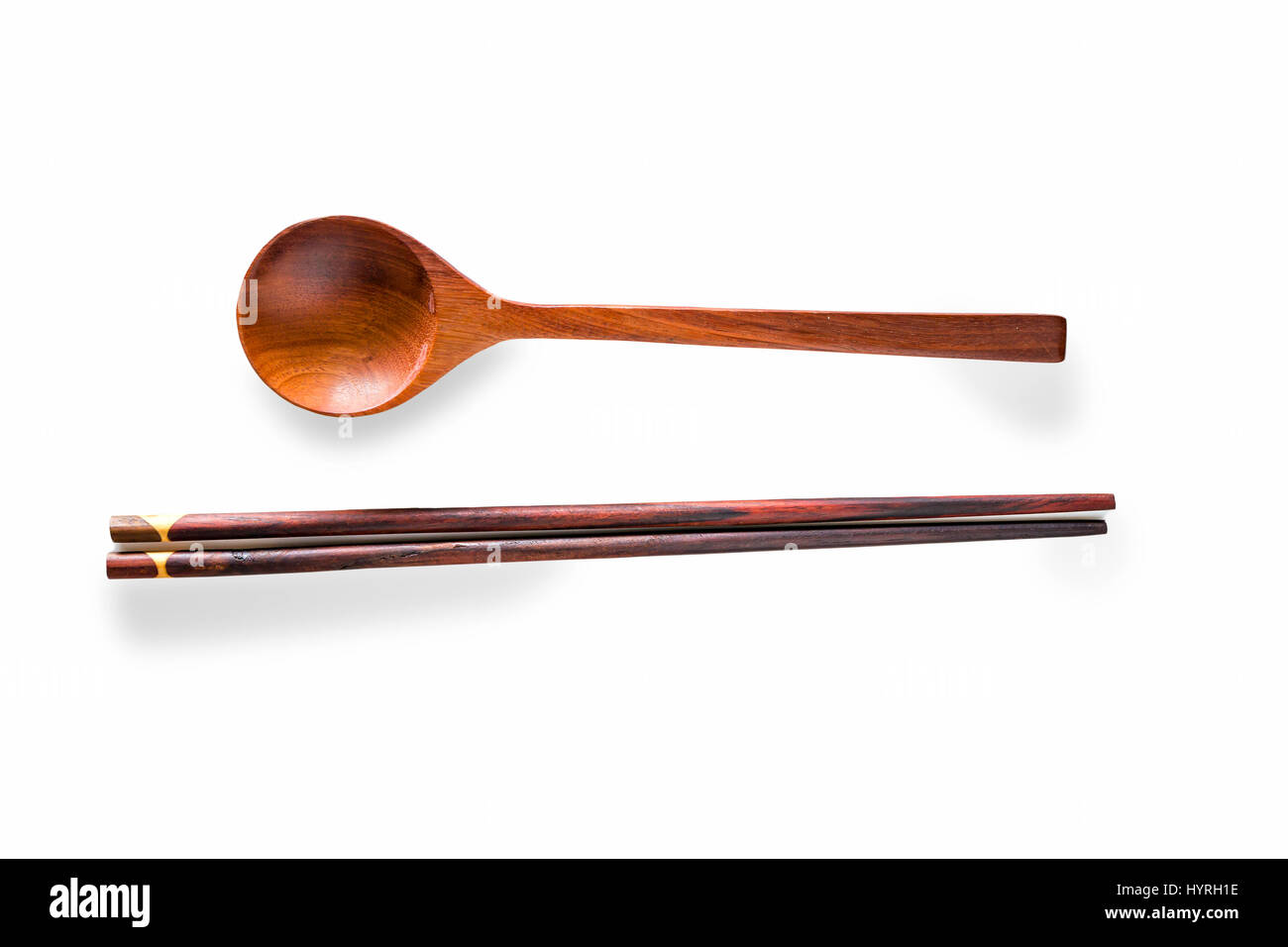 Wooden chopsticks and spoon isolated on white background Stock Photo