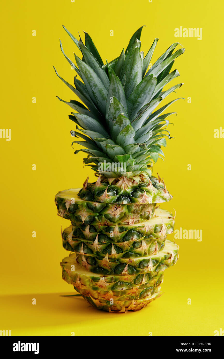 Pineapple On Yellow Background Stock Photo Alamy