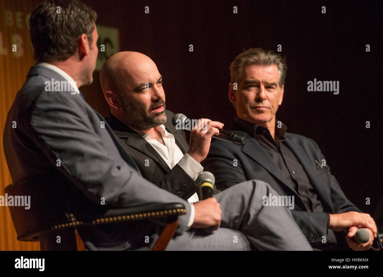 LBJ Presidential Library Director Mark Updegrove (left), author Philipp Meyer, and actor Pierce Brosnan discuss the new AMC television series The Son based on Meyers novel at the LBJ Presidential Library March 13, 2017 in Austin, Texas. Stock Photo