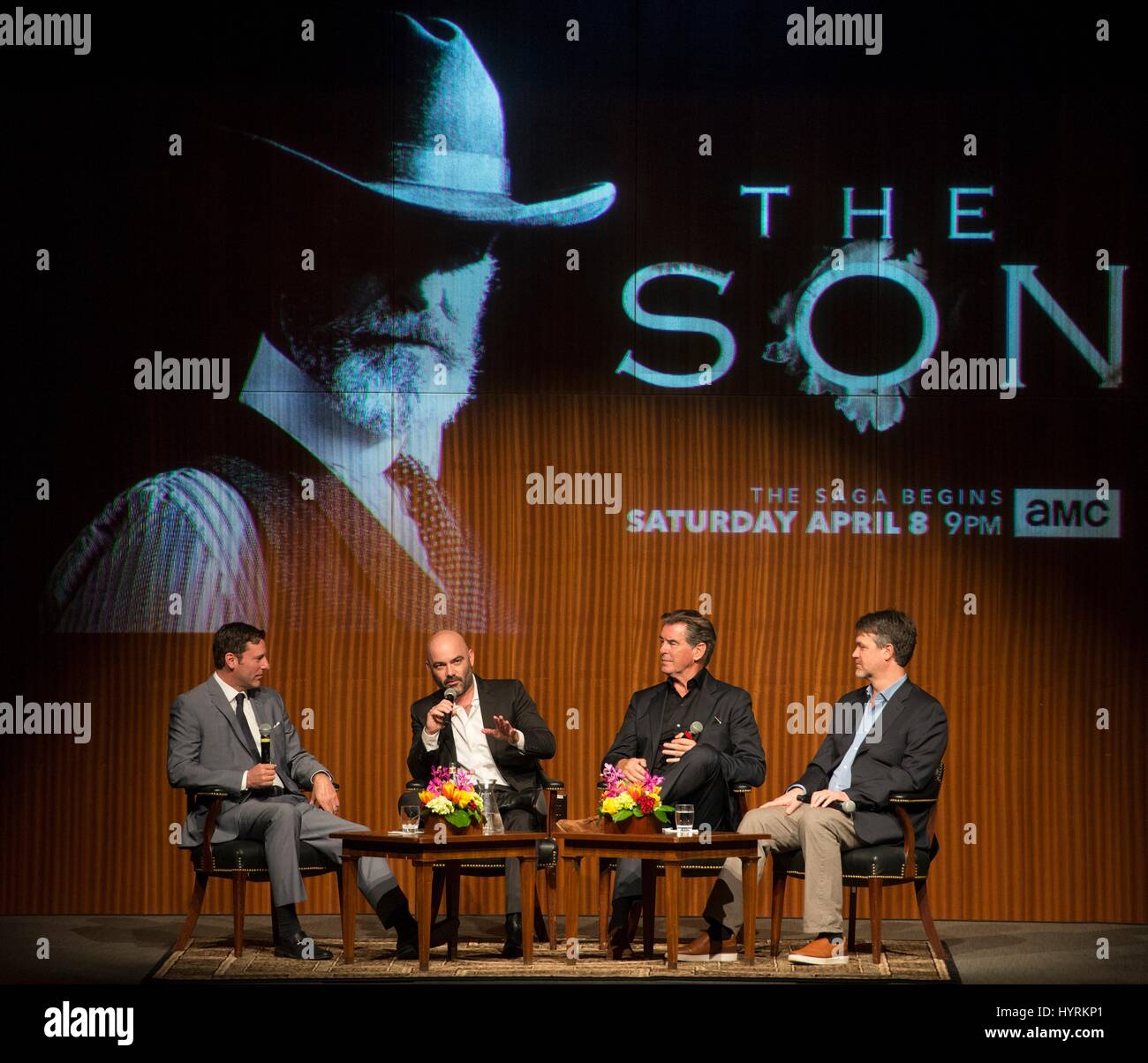 LBJ Presidential Library Director Mark Updegrove (left), author Philipp Meyer, actor Pierce Brosnan, and executive producer Kevin Murphy discuss the new AMC television series The Son based on Meyers novel at the LBJ Presidential Library March 13, 2017 in Austin, Texas. Stock Photo