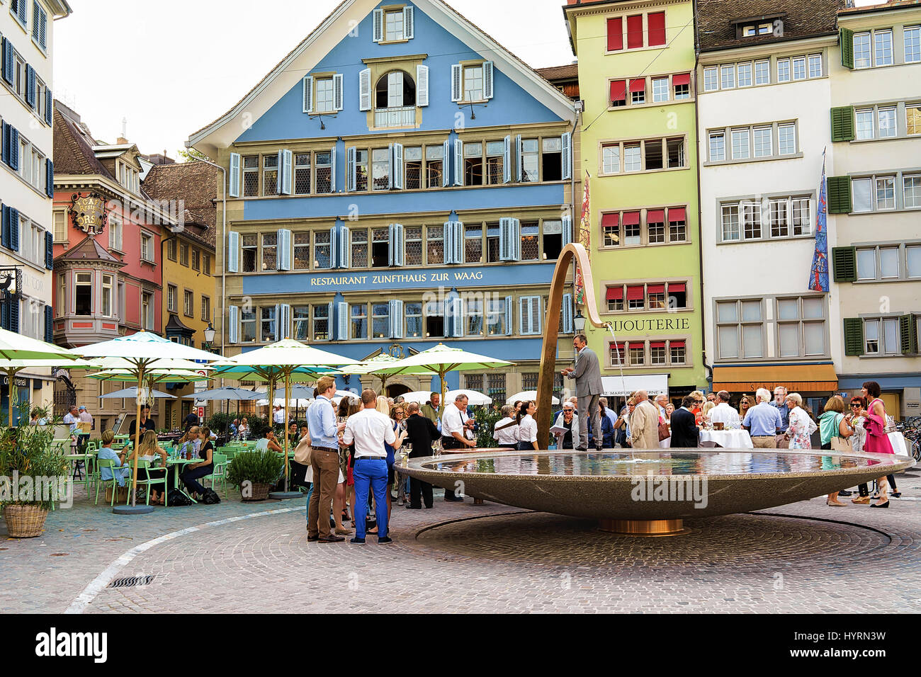 Zurich, Switzerland - September 2, 2016: People and fountain on Square Munsterhof in Zurich, Switzerland Stock Photo