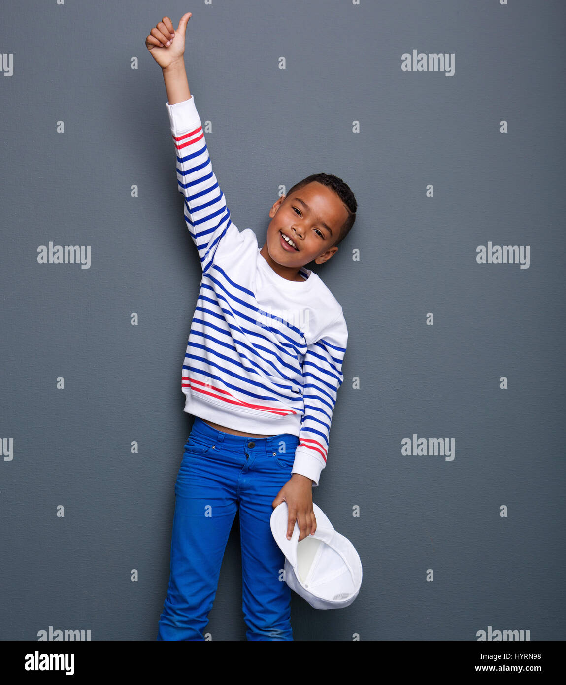 Close up portrait of a little boy smiling with thumbs up gesture Stock ...