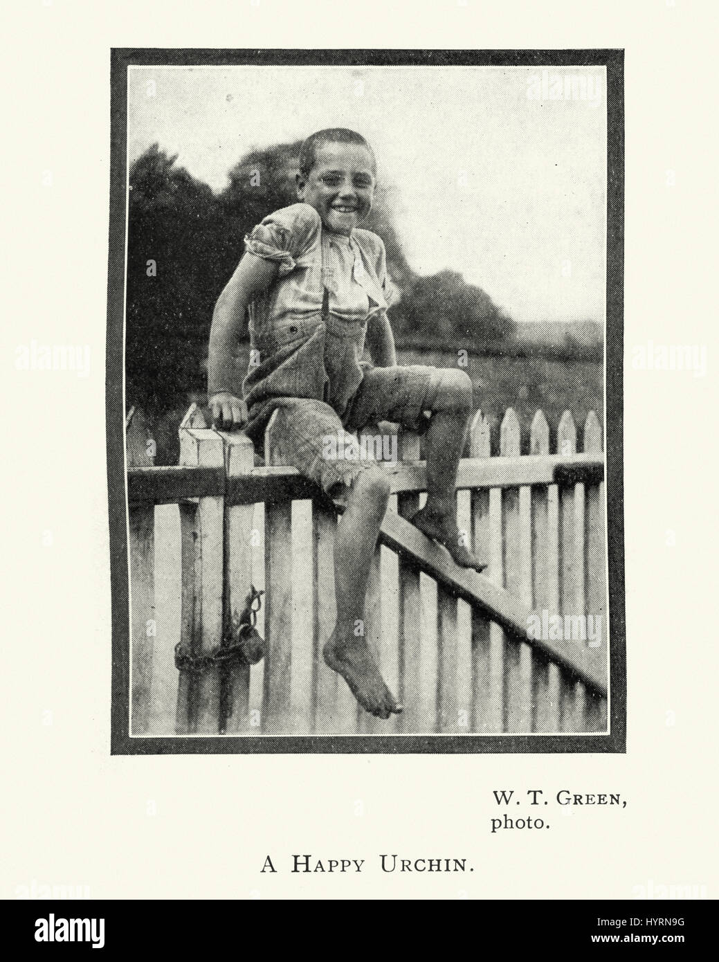 Vintage photograph of A Happy Urchin, c. 1913. by Walter Thomas Greenland  (W T Green) Stock Photo
