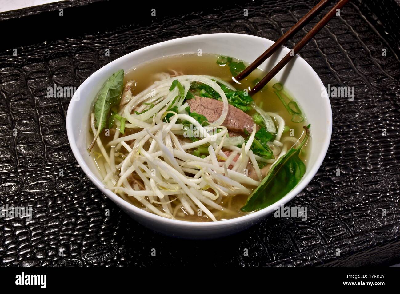 Bowl of Vietnamese pho noodle soup Stock Photo - Alamy