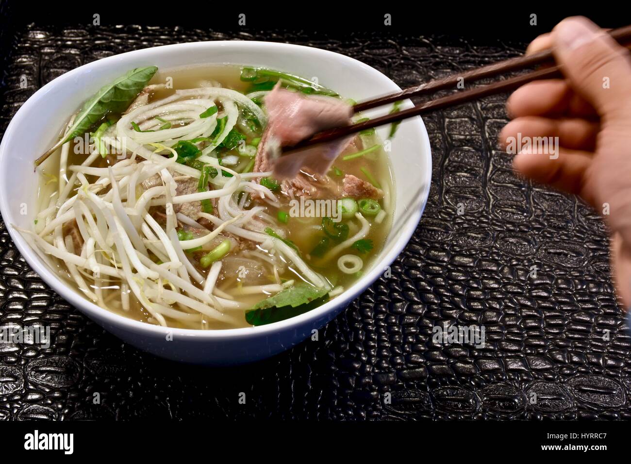 Bowl of Vietnamese pho noodle soup Stock Photo - Alamy