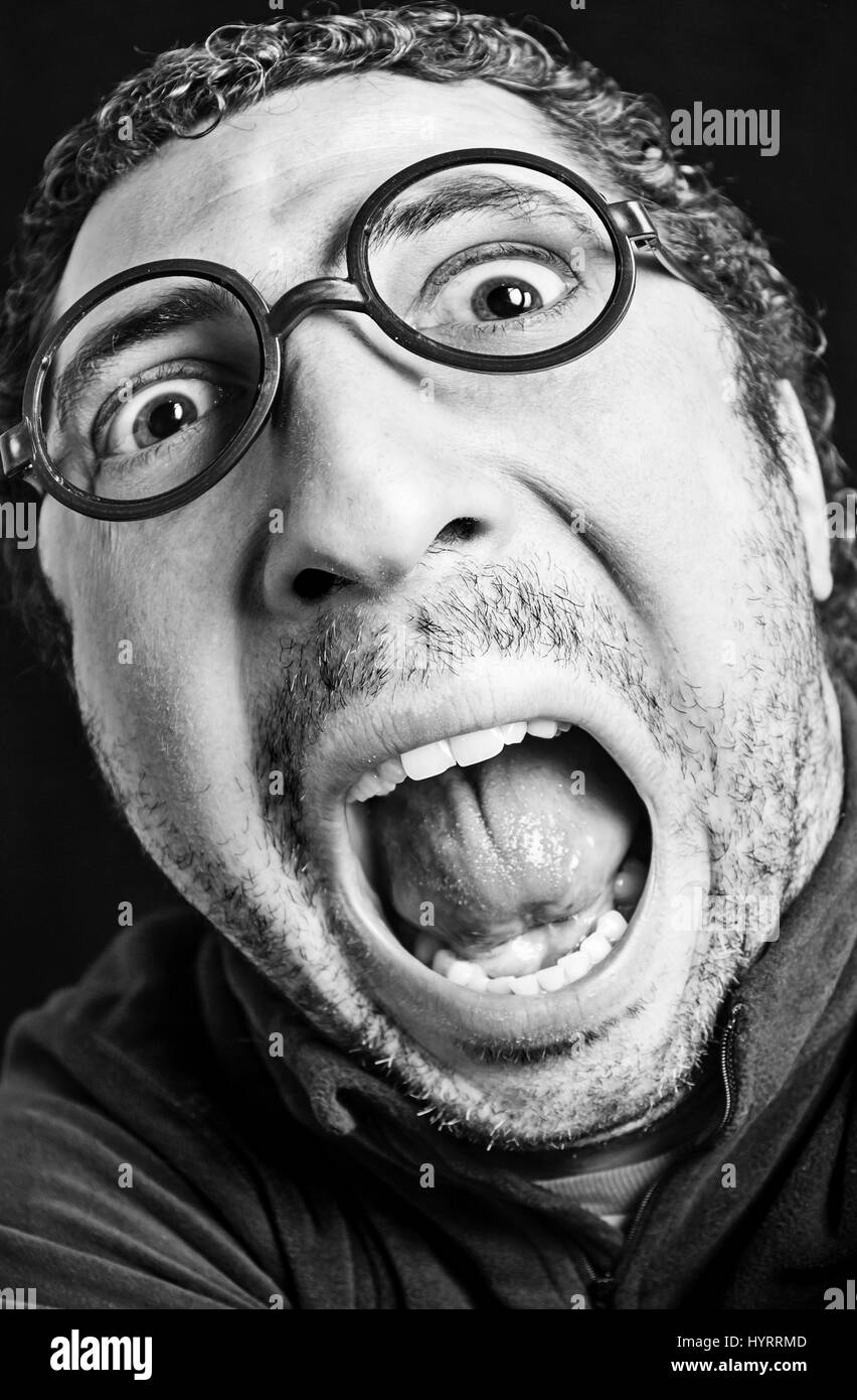 Adult man yelling, detail of a person expressing feelings and emotions