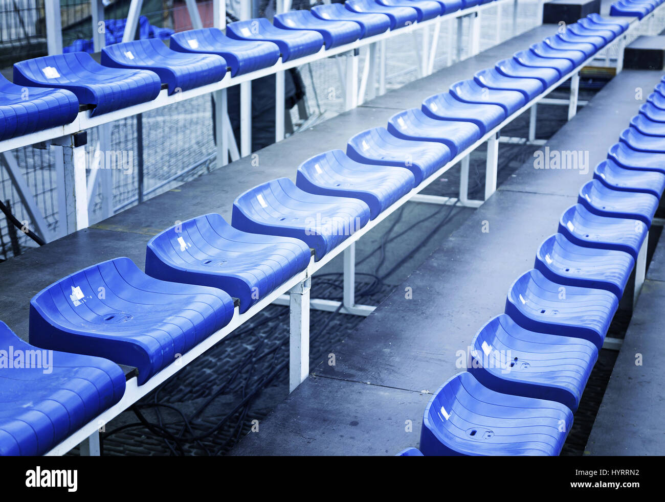 Bleachers in a football stadium, detail of a sports venue, seating for
