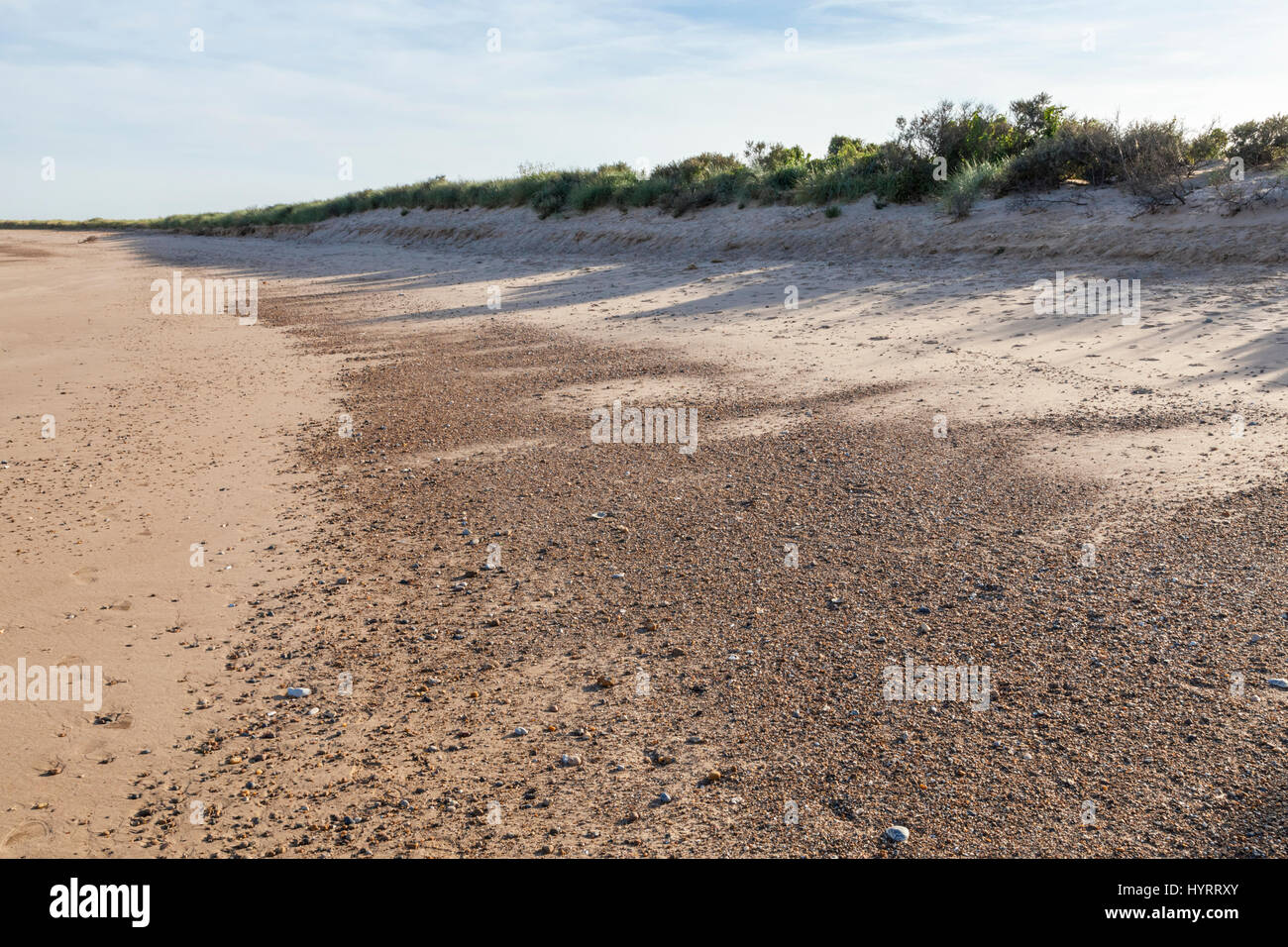 Evening light falling across the empty beach at Gibraltar Point on the Lincolnshire coast, England, UK Stock Photo