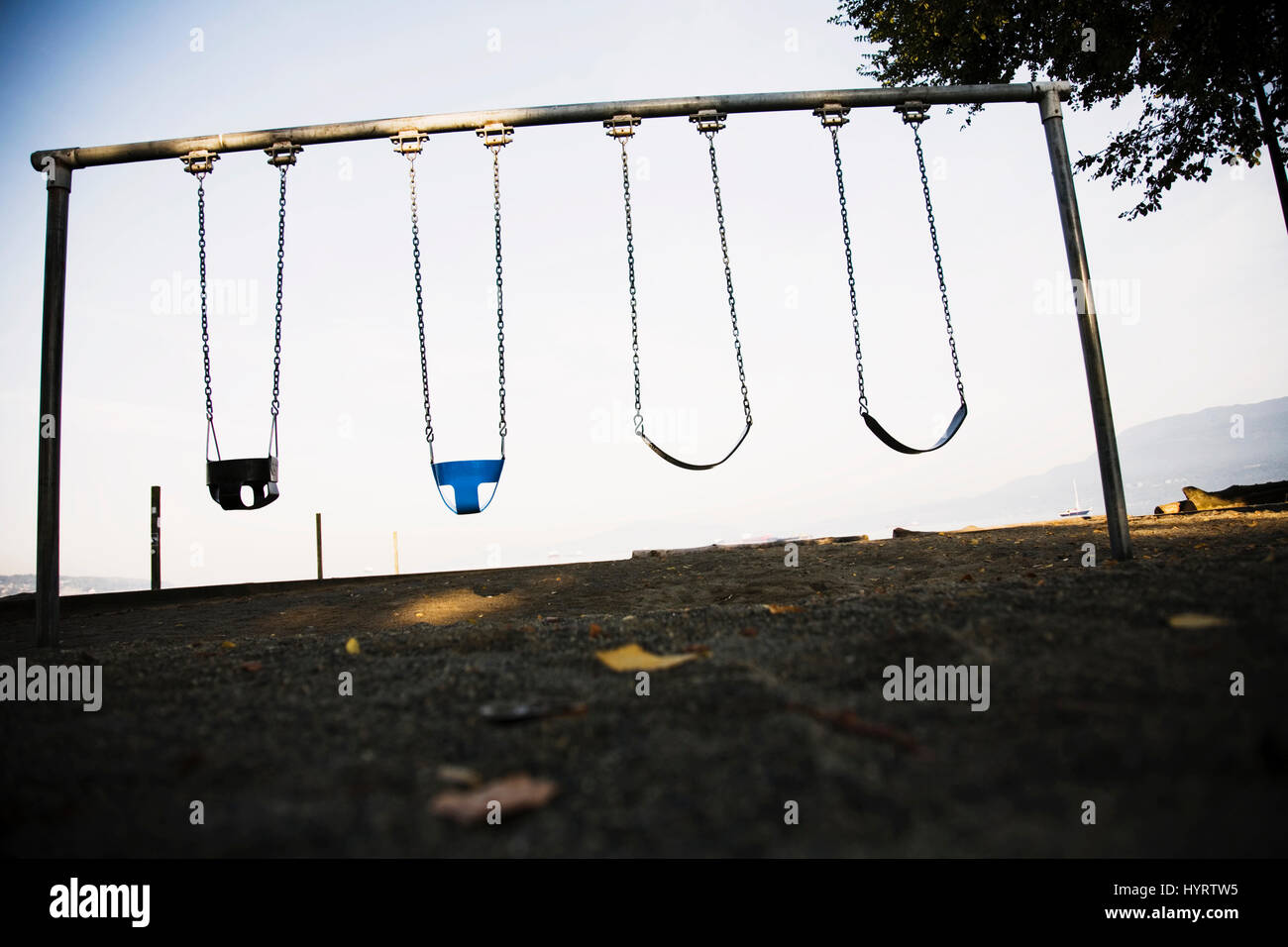 Swings at the beach Stock Photo Alamy