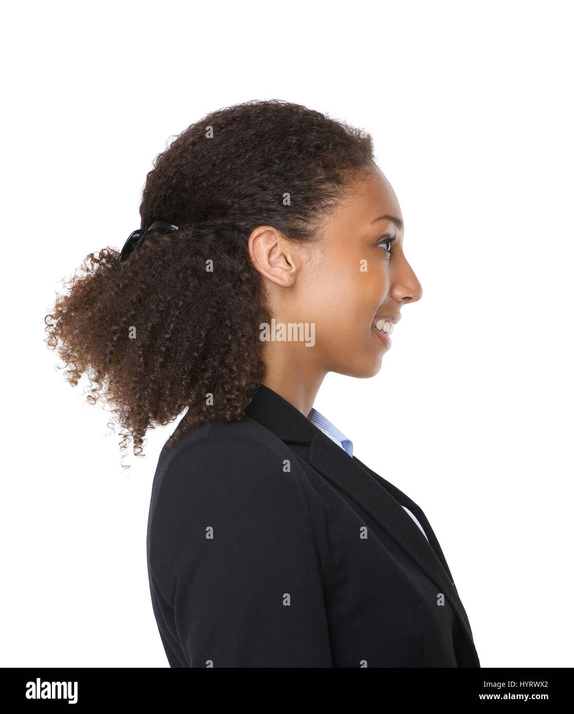 Side view portrait of a a young business woman smiling on isolated ...