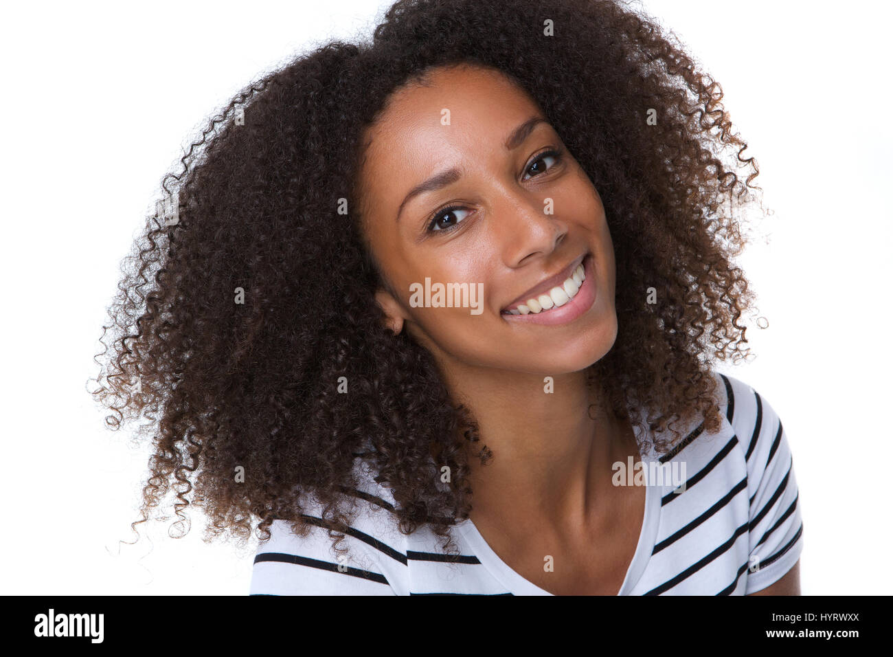 Close up portrait of a pretty young black woman smiling on isolated ...