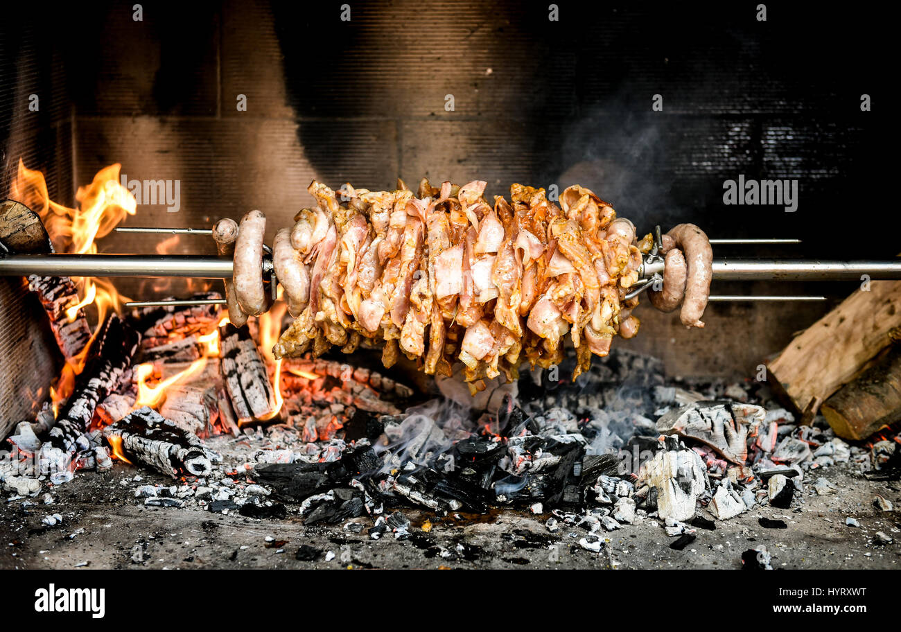 Making home made cag kebab gyros with fire and charcoal. Cağ or döner