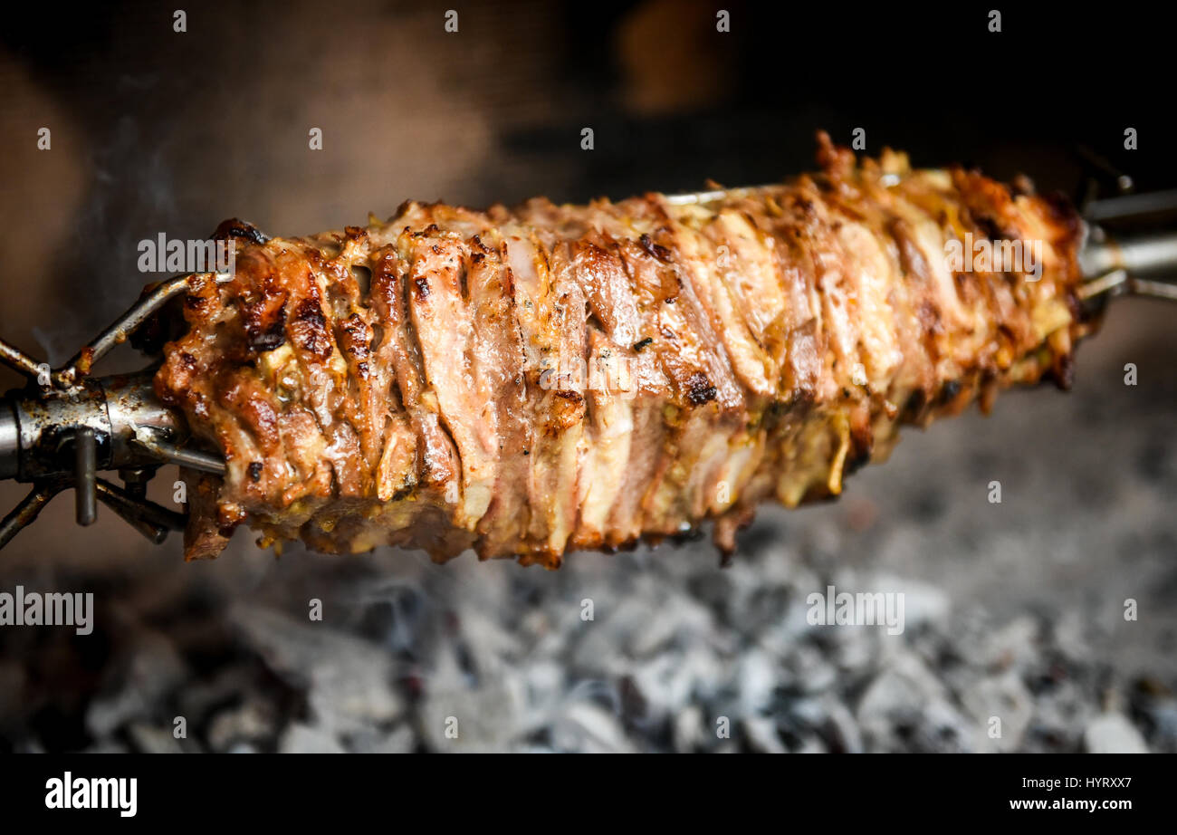 Making home made cag kebab gyros with fire and charcoal. Cağ or döner