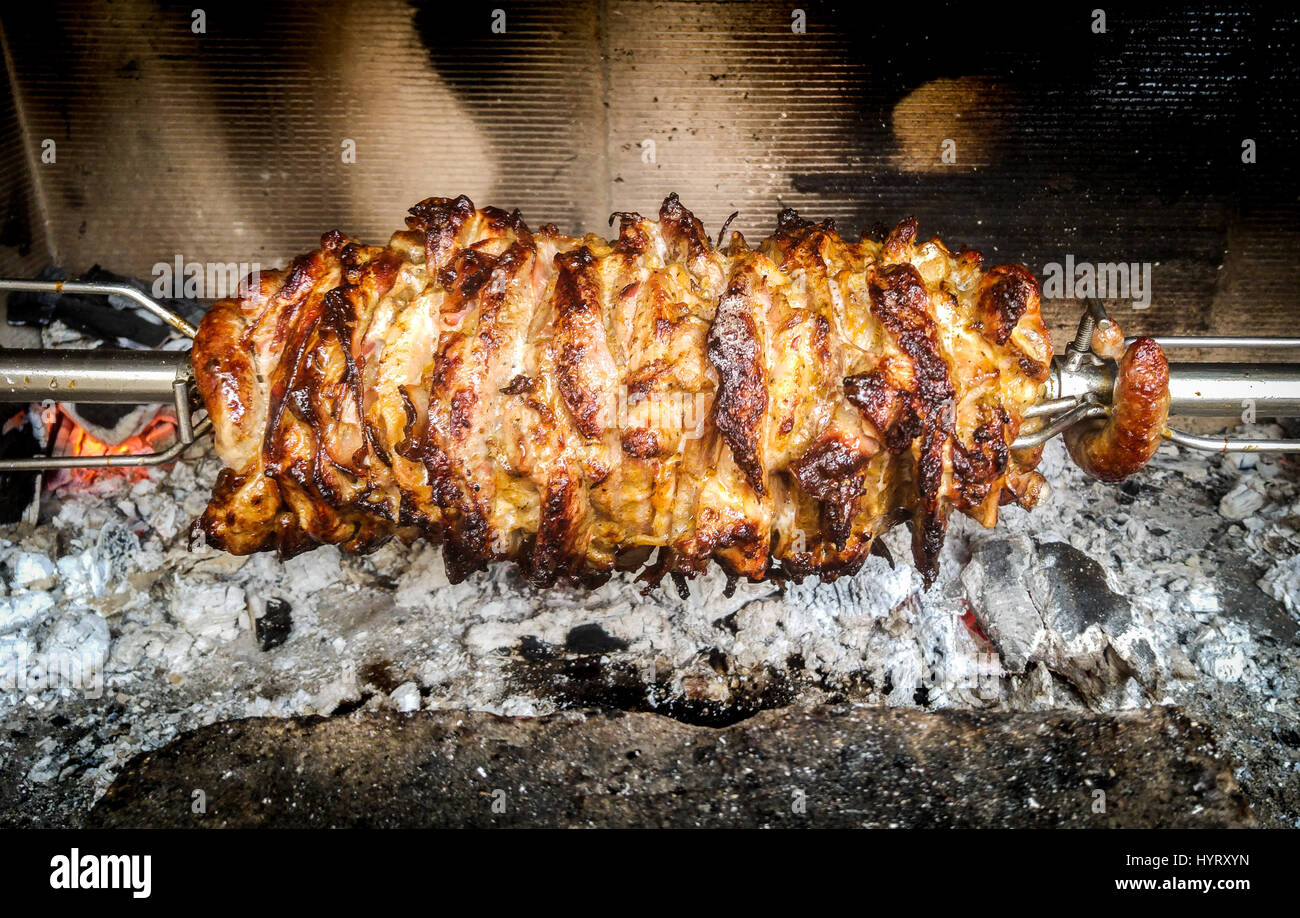 Making home made cag kebab gyros with fire and charcoal. Cağ or döner