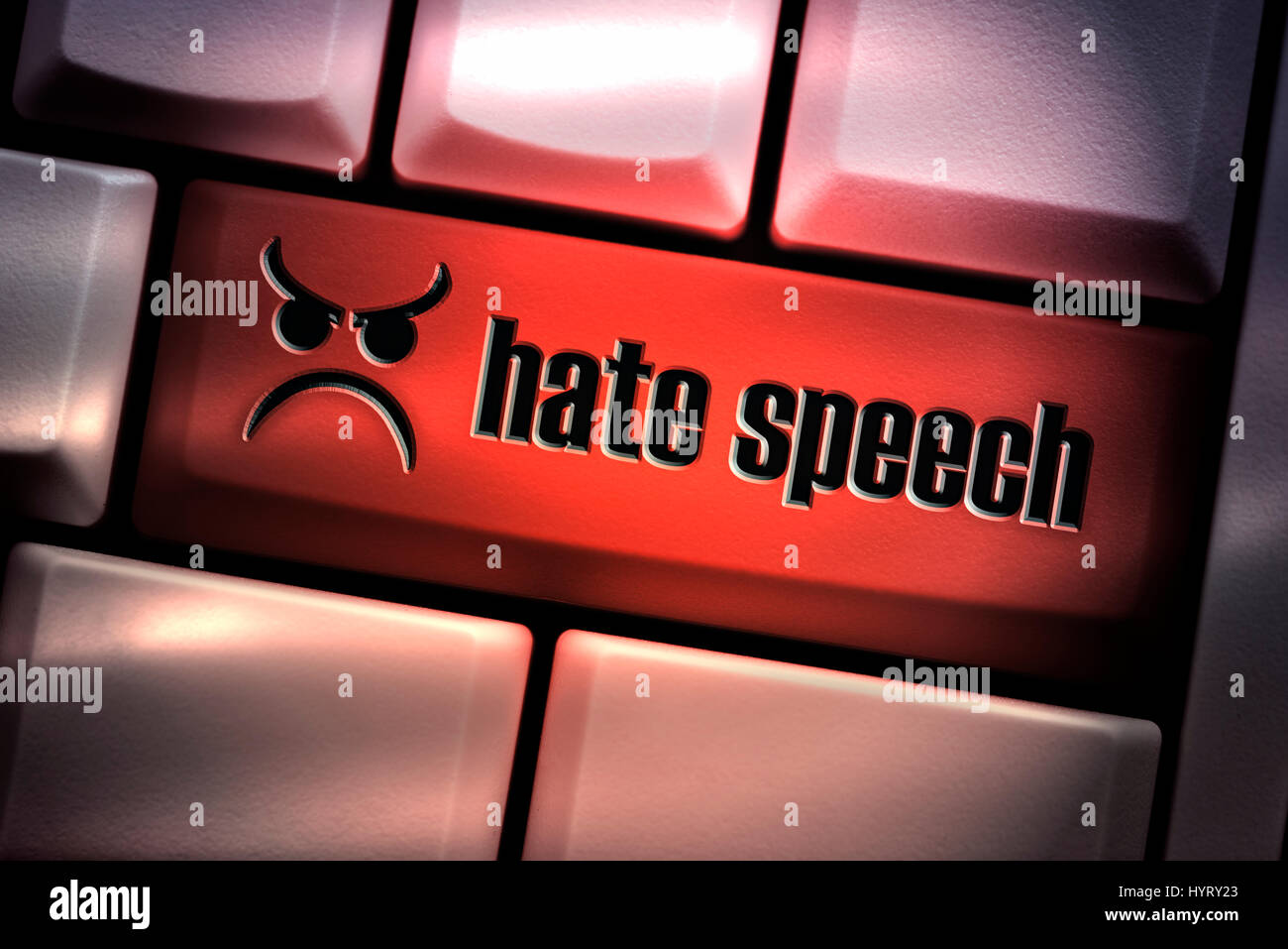 Hate speech key on computer keyboard Stock Photo