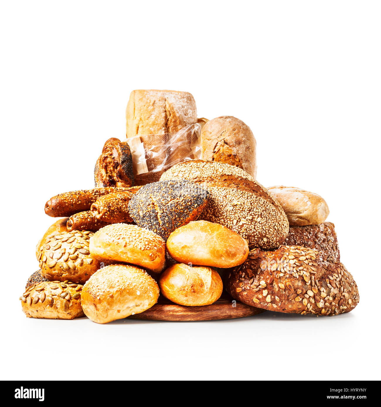 Different fresh bread rolls and buns pile isolated on white background clipping path included Stock Photo