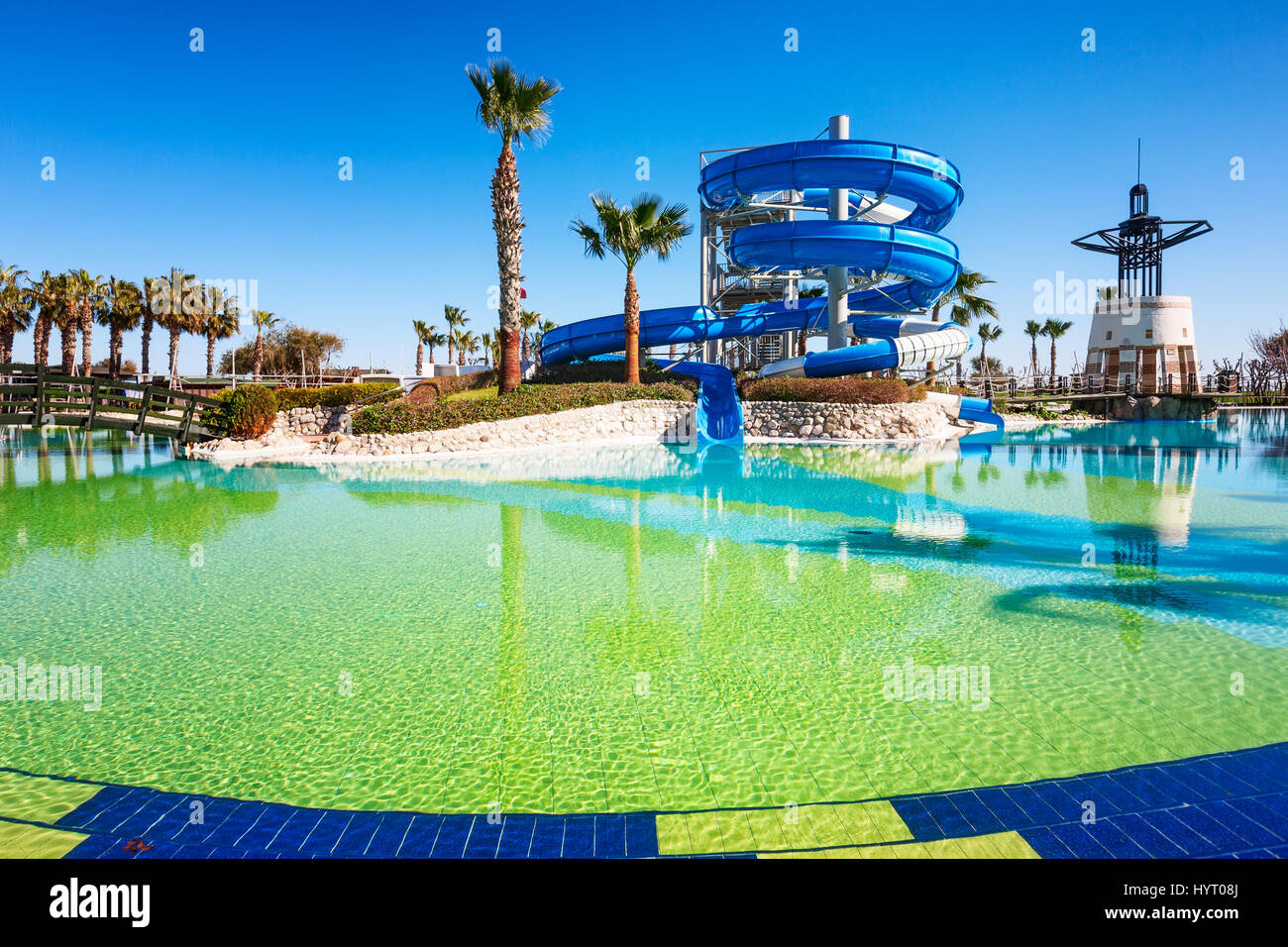 Water park slide and swimming pool in luxury exotic resort Stock Photo