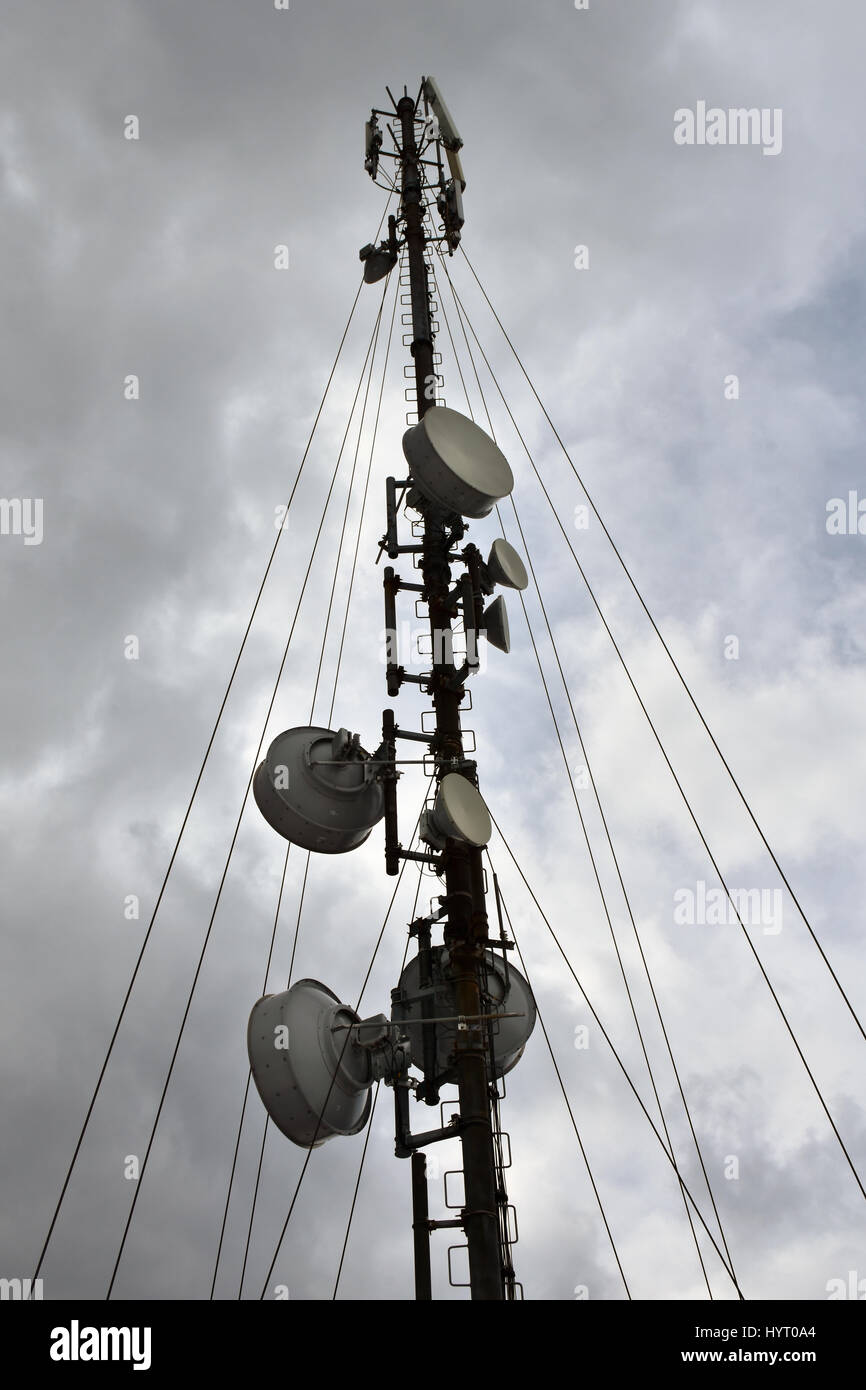 Antenna tower in stormy winter day Stock Photo