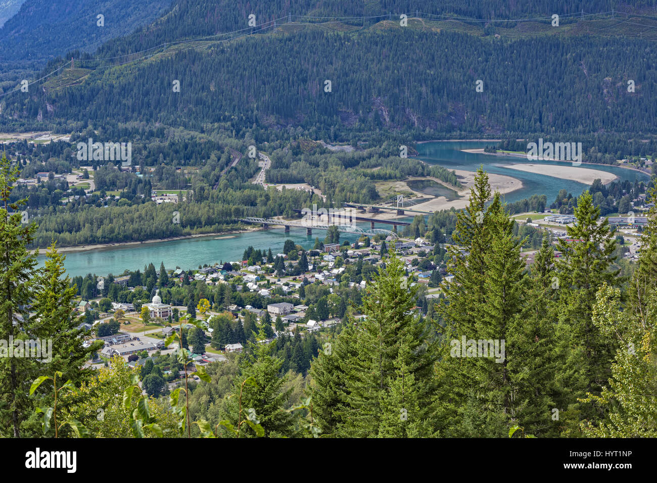 A view of Revelstoke townsite and bridges crossing the Columbia River Revelstoke British Columbia Canada Stock Photo