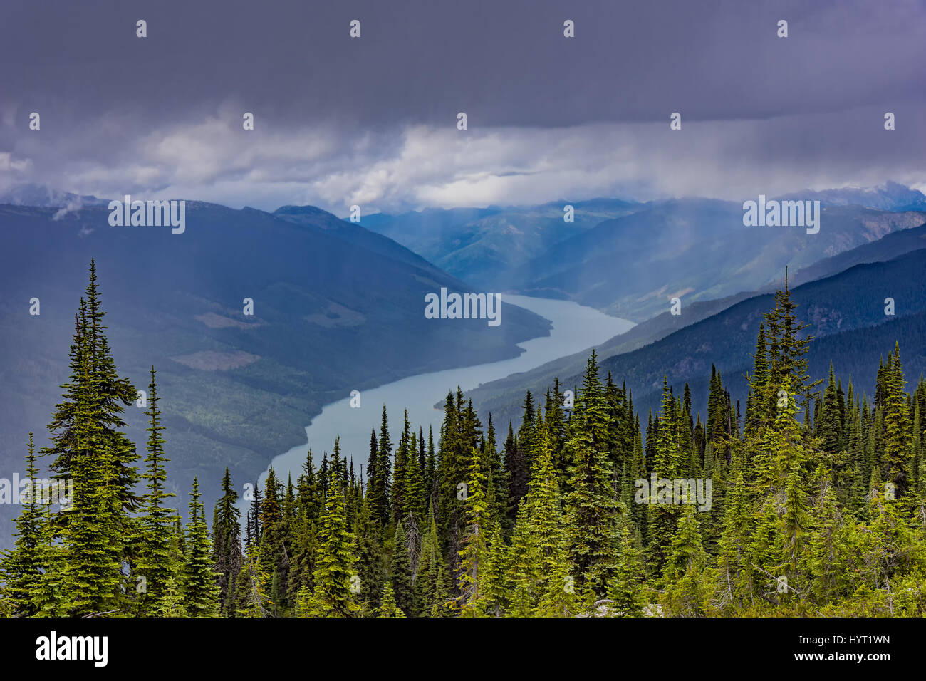 An elevated view of Lake Revelstoke from Mount Revelstoke British Columbia Canada on a stormy day Stock Photo