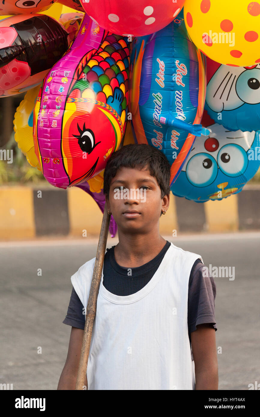 Child selling balloons hires stock photography and images Alamy
