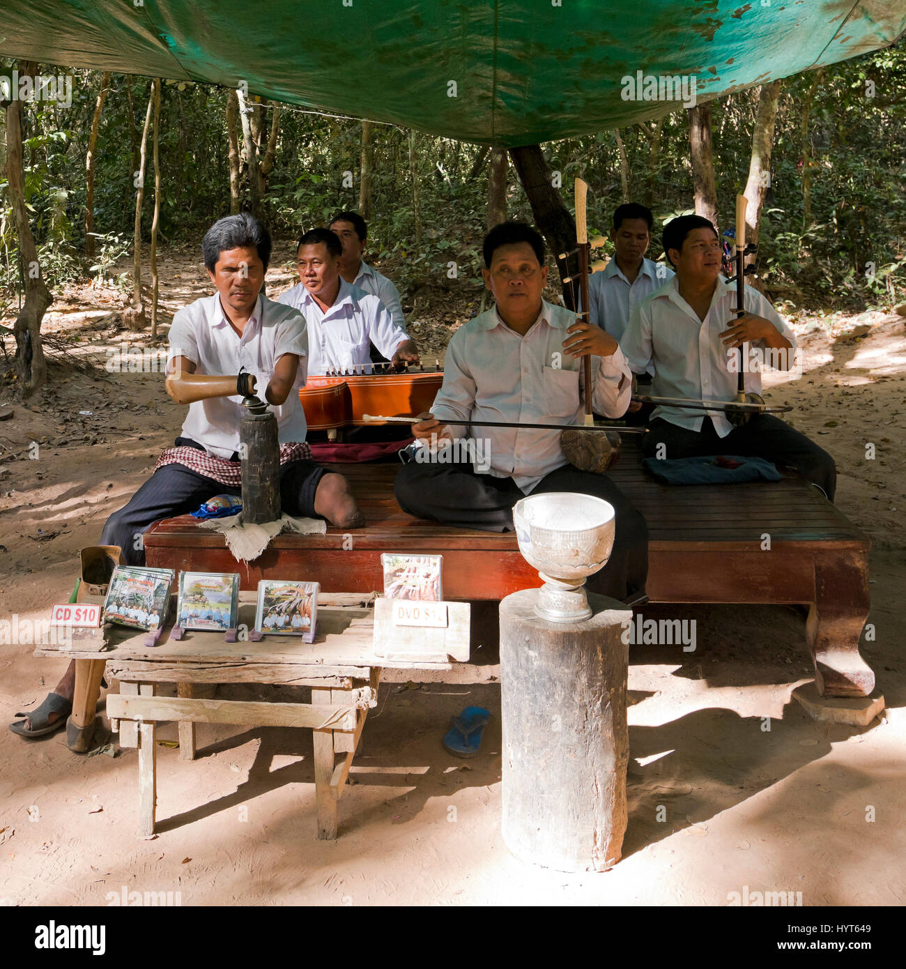 Square portrait of musicians playing traditional musical instruments in Cambodia Stock Photo