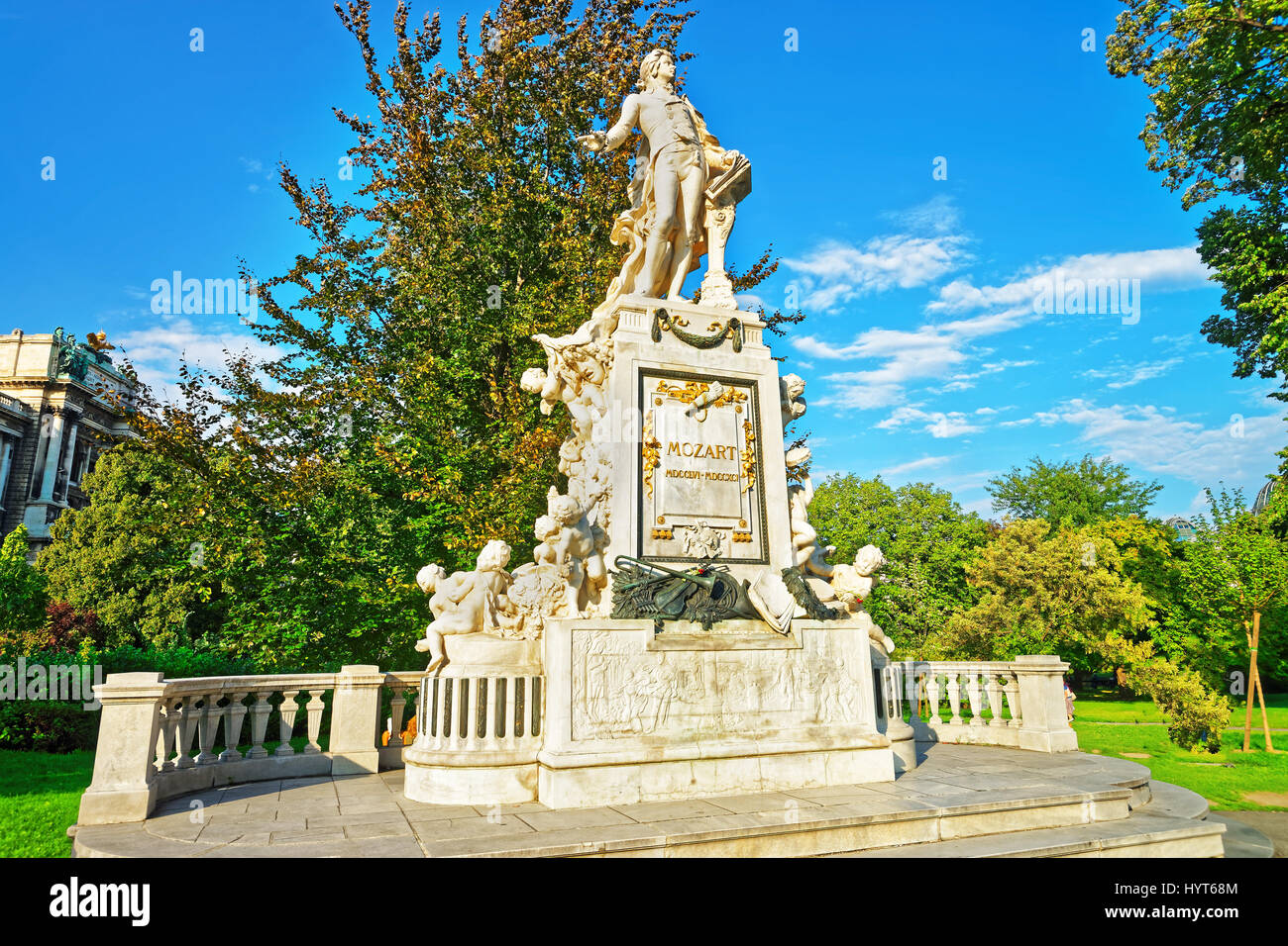 Mozart statue in Burggarten Park, Vienna in Austria. People on the ...