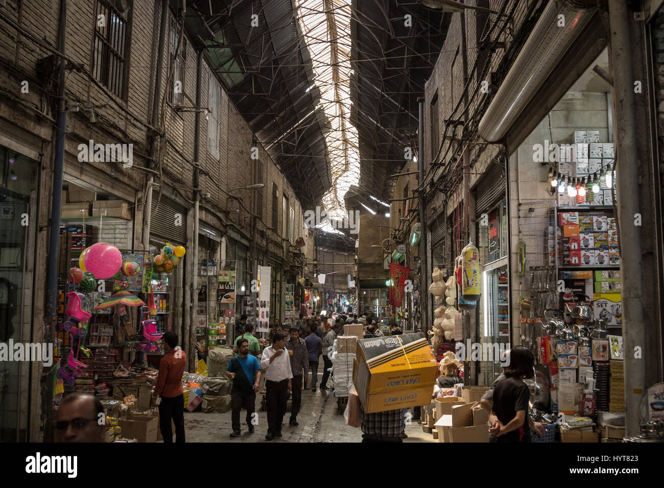 Picturesque photo of Tehran bazaar with warm colors and iranians walking. Stock Photo