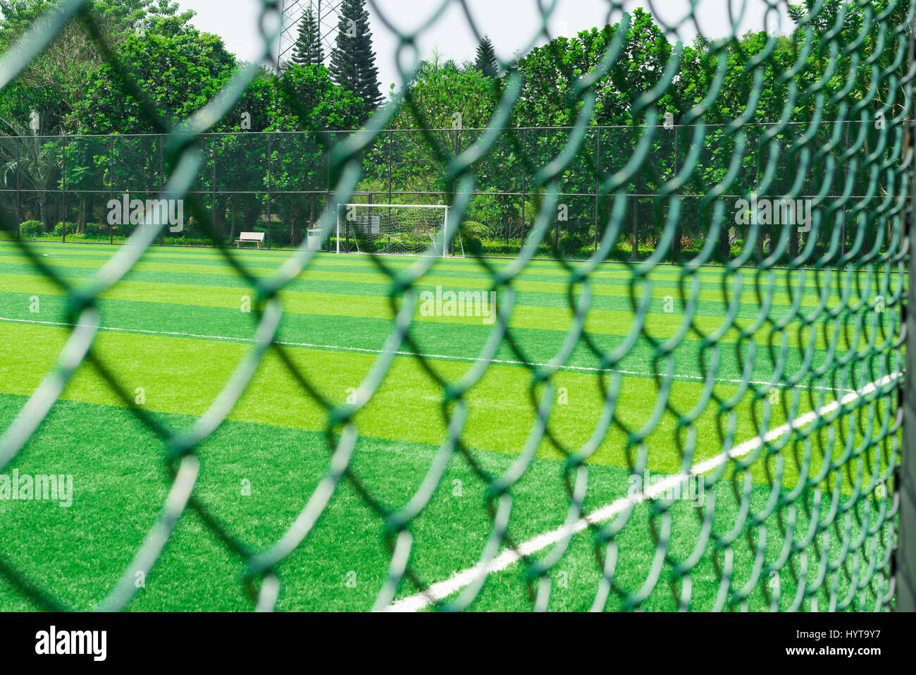 a soccer field behind the fence Stock Photo Alamy