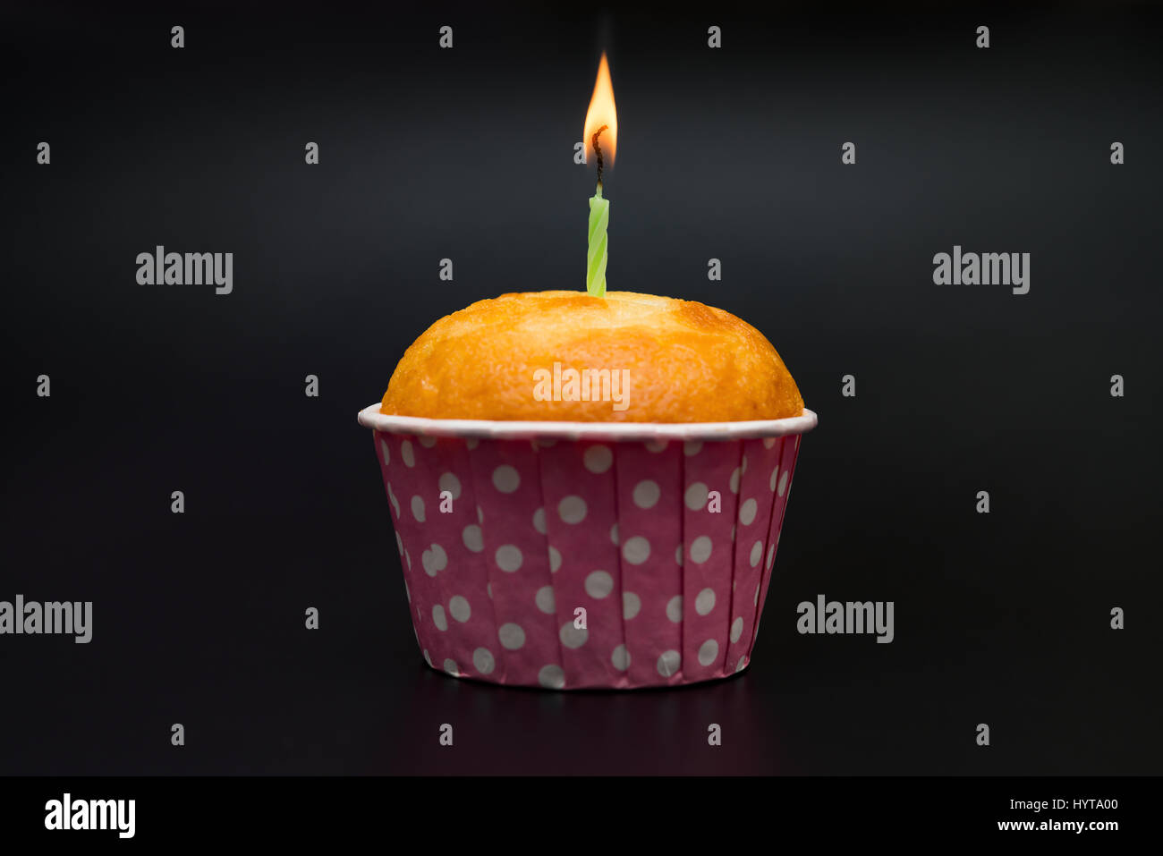 homemade birthday cake with burning candle on a black background Stock ...