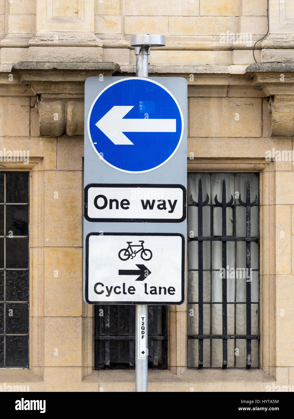 Sign for contraflow bicycle traffic in central Cambridge UK Stock Photo