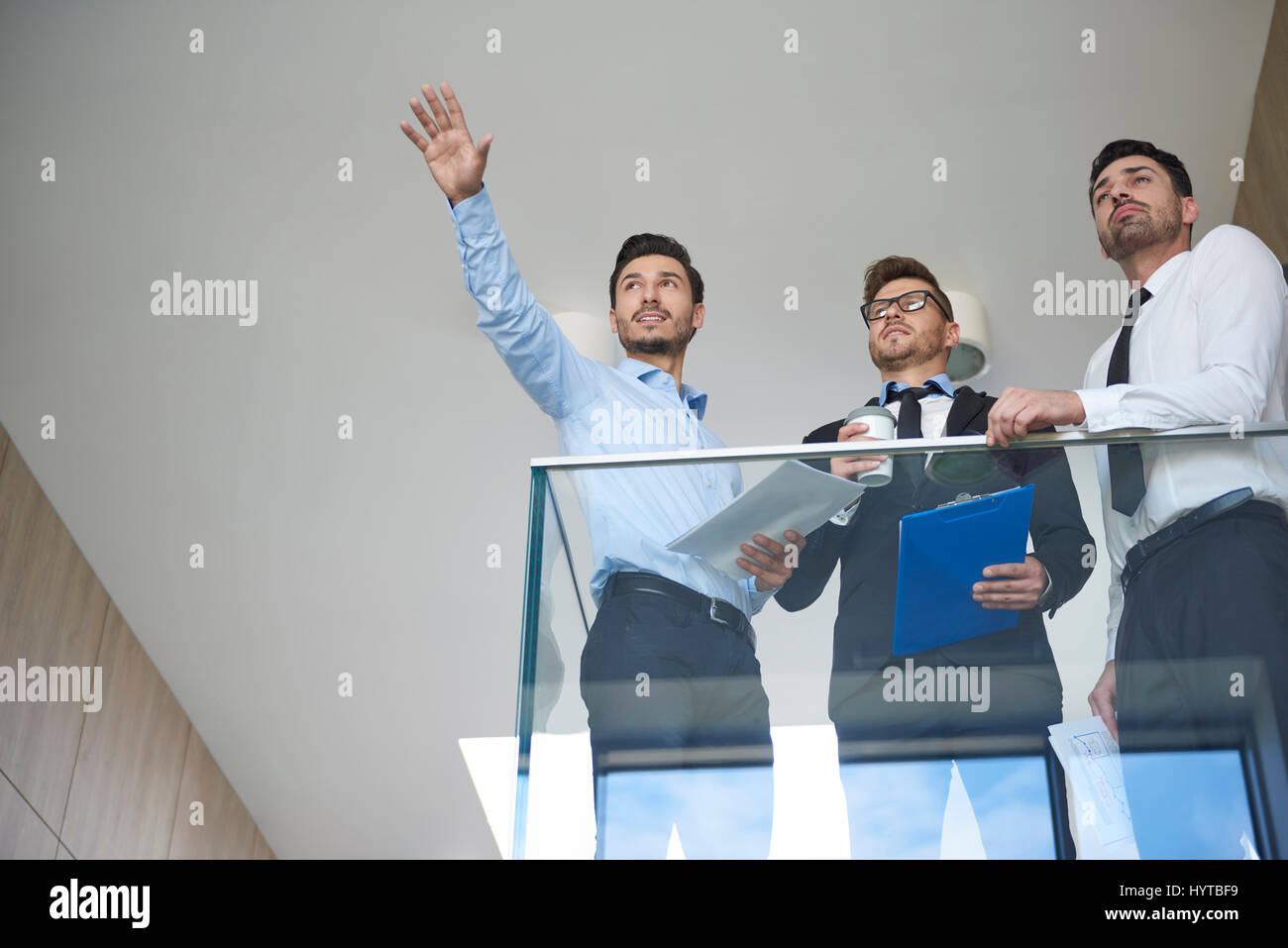 Men creating a vision of big company Stock Photo Alamy