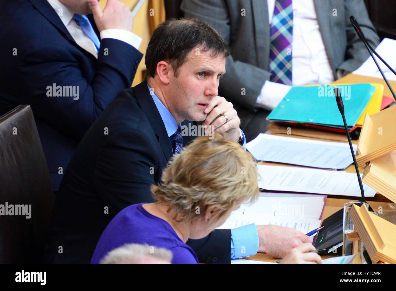 Justice Secretary Michael Matheson in the Scottish Parliament during the passage of legislation ending automatic early release of prisoners in Scotland Stock Photo