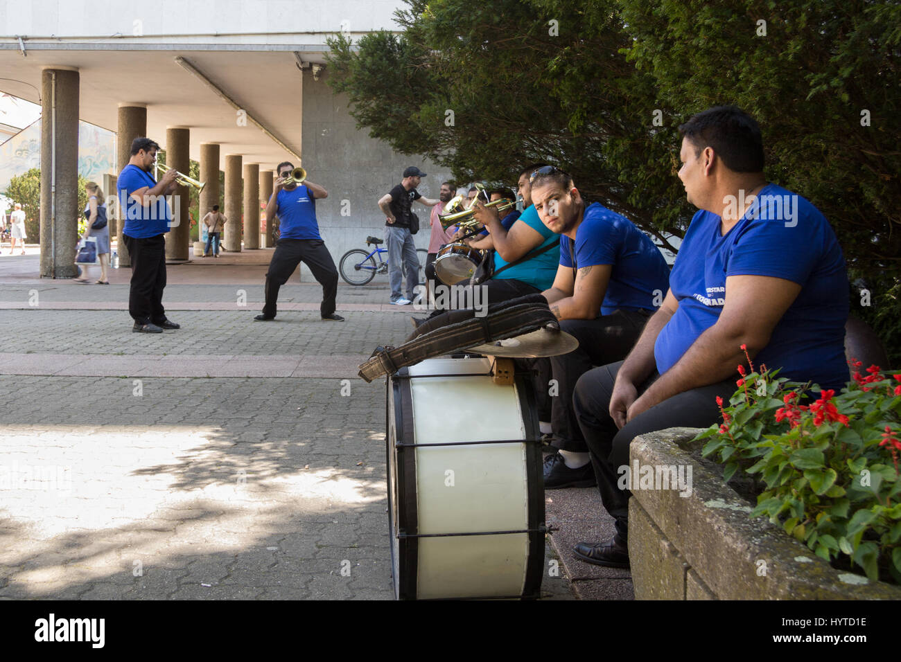 PANCEVO, SERBIA - AUGUST 1, 2015:Roma music band rehearsing before a wedding performance   Picture of a group of roma   playing music and singing to p Stock Photo