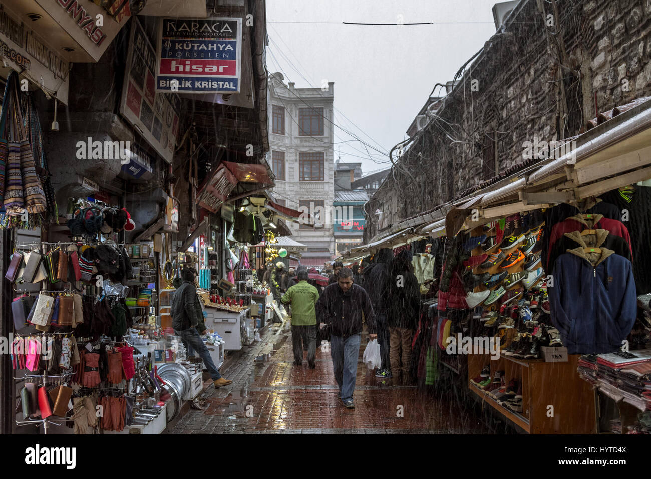 ISTANBUL, TURKEY - DECEMBER 30, 2015: Snow storm hitting a typical Istanbul street near the Spice market   Picture of a snow storm over a typical baza Stock Photo