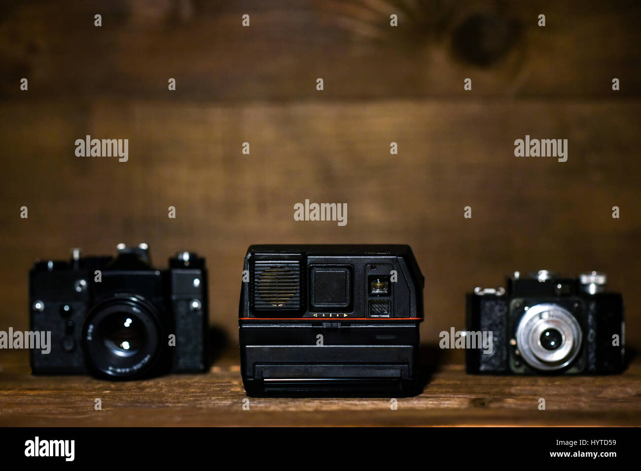 Olda cameras on a wooden background with copy space Stock Photo Alamy