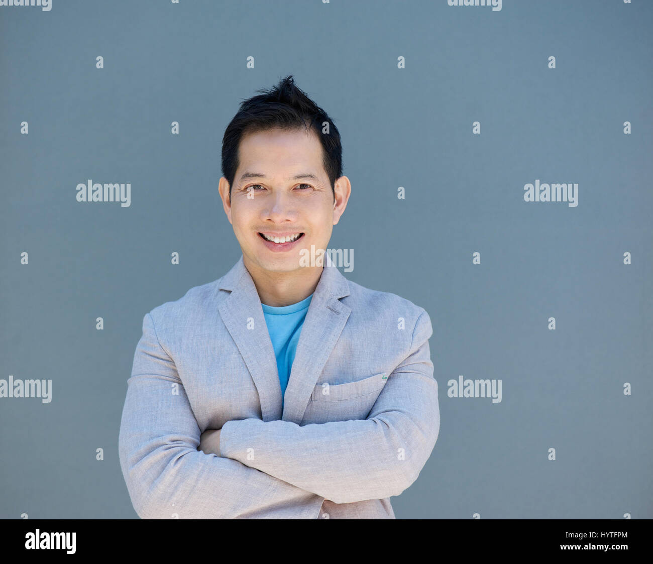 Asian man smiling hi-res stock photography and images - Alamy