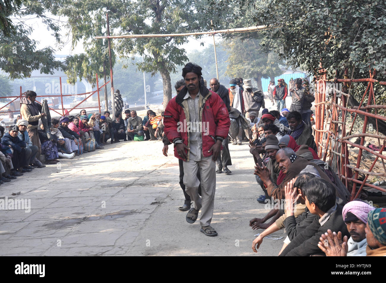 Street People, waiting for food, donate food by NGO, New Delhi (Photo Copyright © by Saji Maramon) Stock Photo
